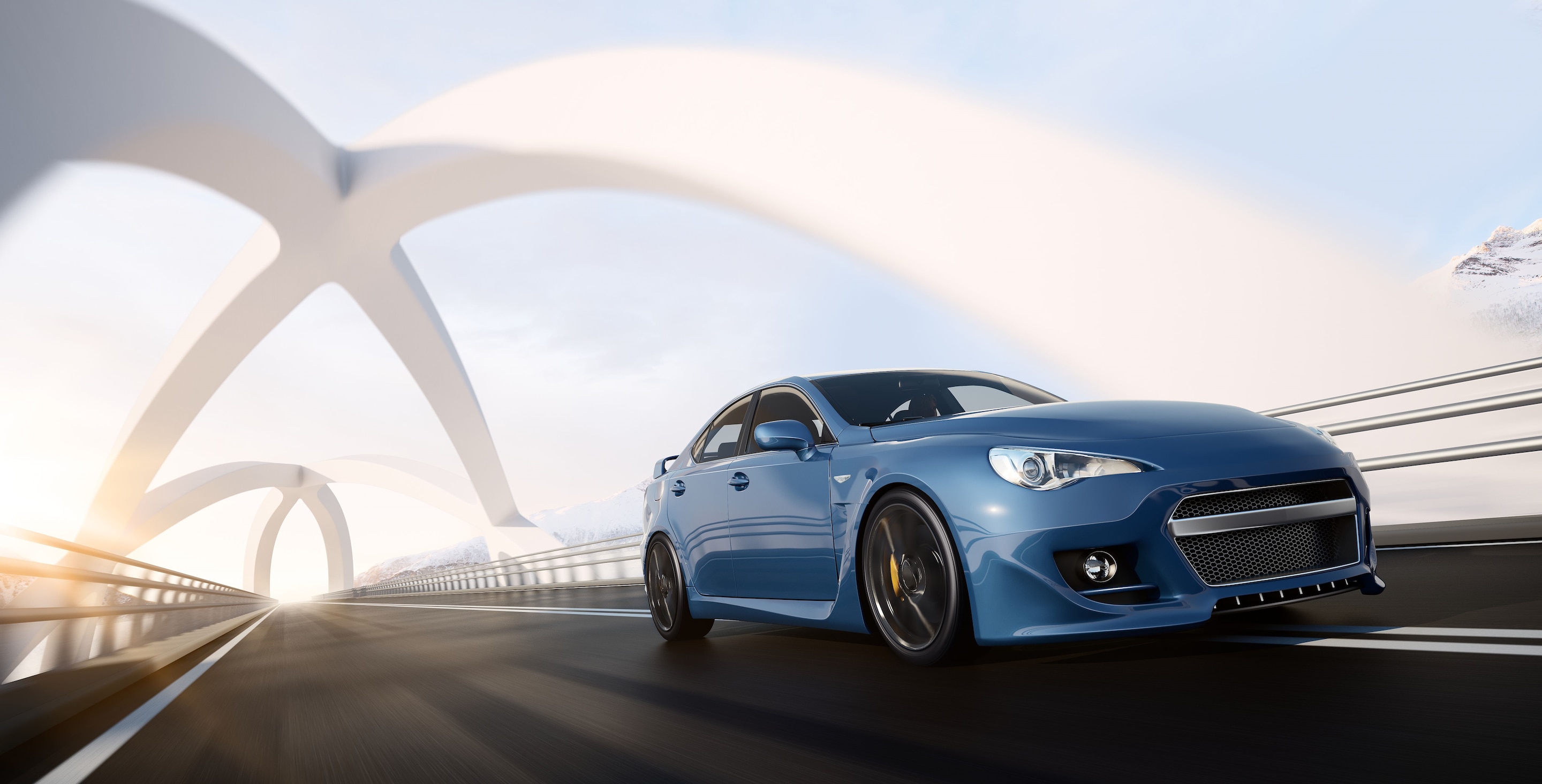 晴朗的天空下，一辆蓝色跑车行驶在一座带有白色拱式结构的现代化桥梁之上。