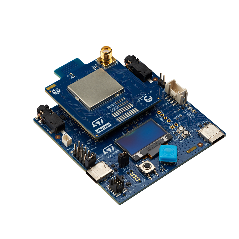 Stacked STMicroelectronics evaluation boards with pin headers.